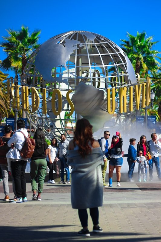 people walking on street during daytime in Universal Studios