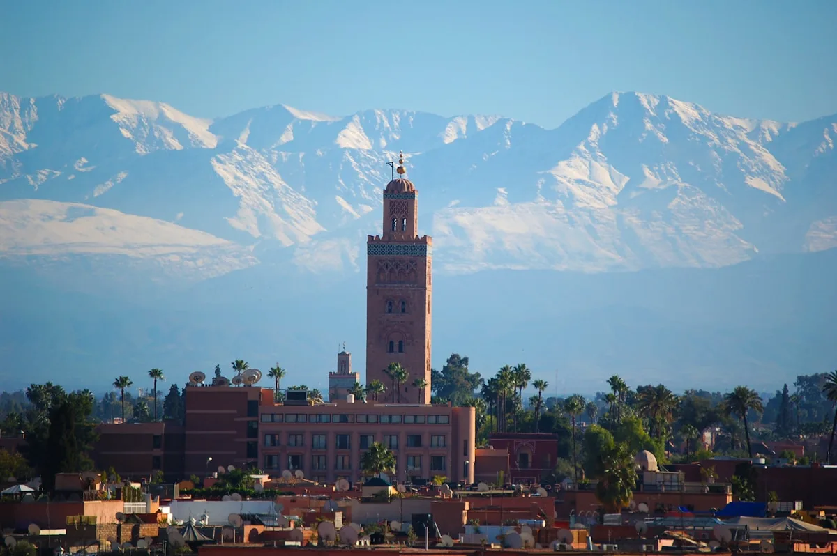 brown concrete building near mountain during daytime Marrakech