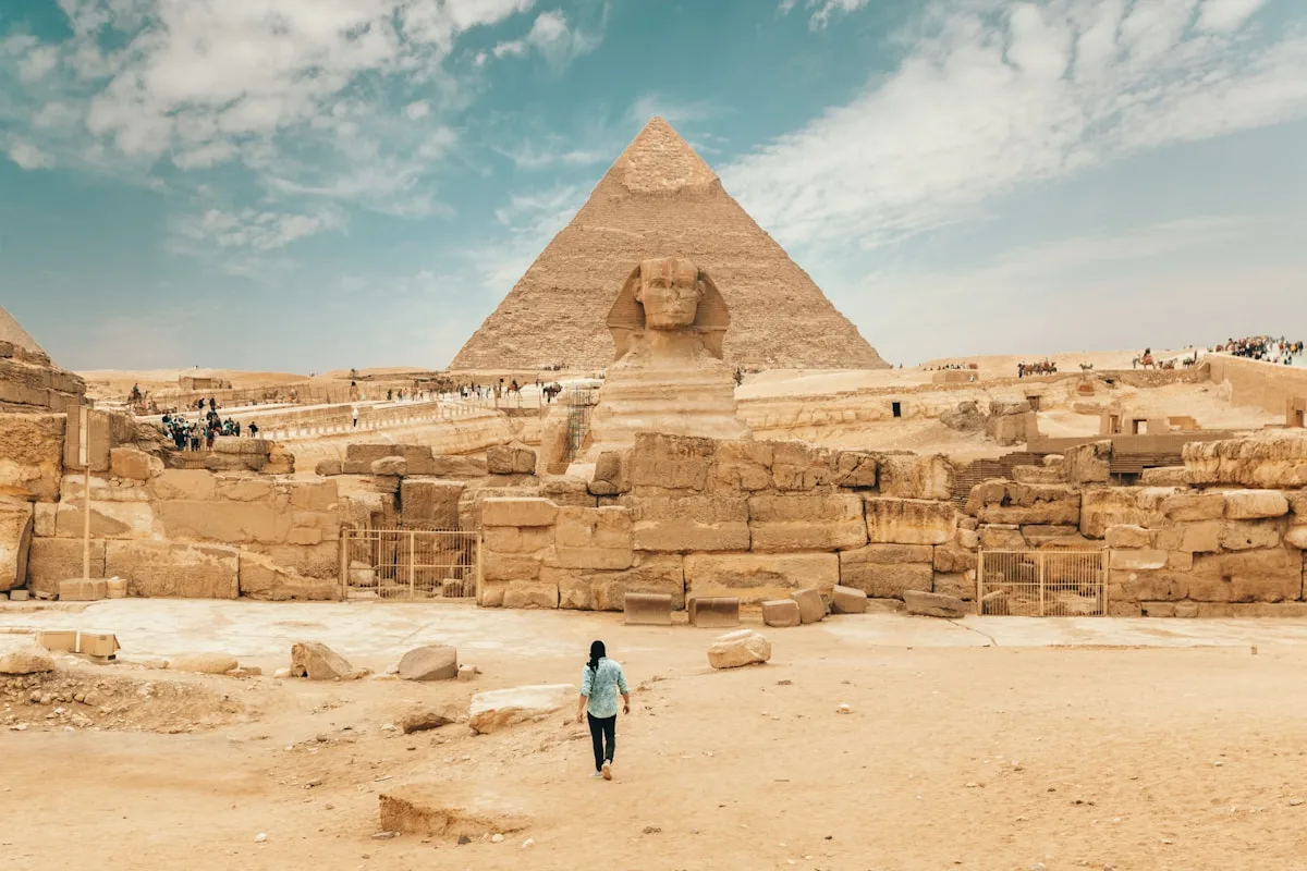 person walking near The Great Sphinx Cairo