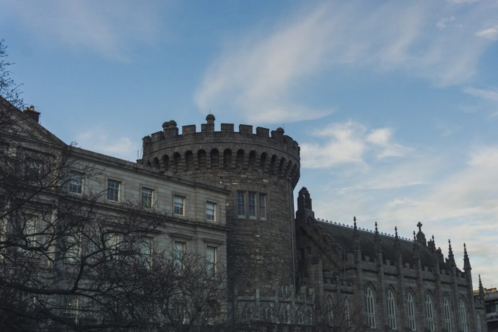 brown concrete building under blue sky during daytime in the Dublins Castle