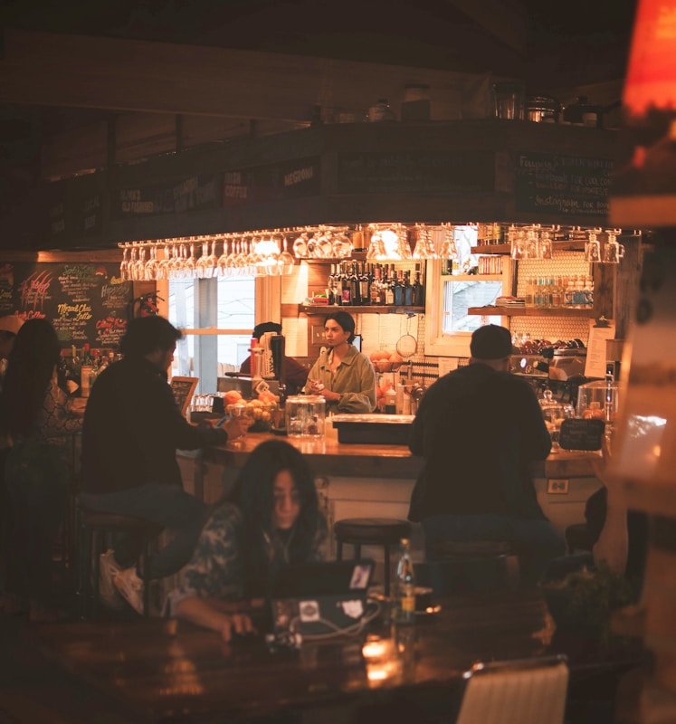 woman standing at the bar counter Berlin Bar in Melbourne